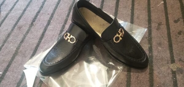 Black leather loafers